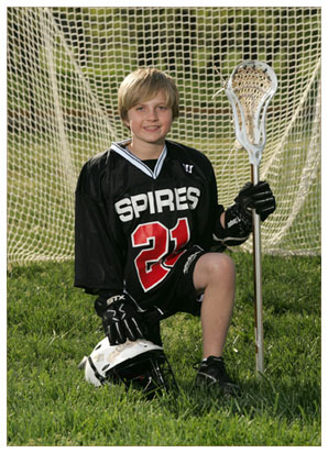 A teenage boy poses for portraits in his lacrosse uniform Stock Photo -  Alamy